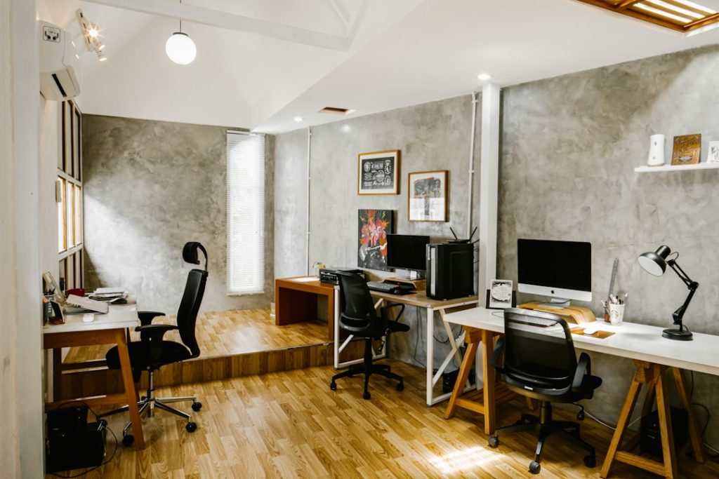 Modern office with desks and computer workspaces