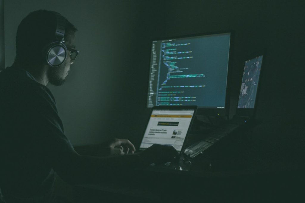 Programming laptop representing browser fingerprinting and remote workspace analysis