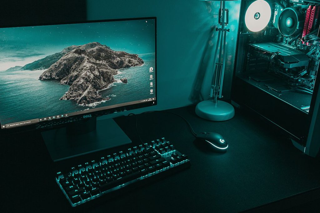 Desktop monitor and keyboard in a computer workstation