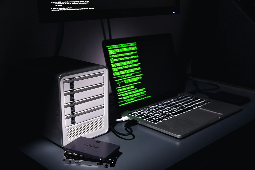 External storage drives connected to a laptop for transferring files