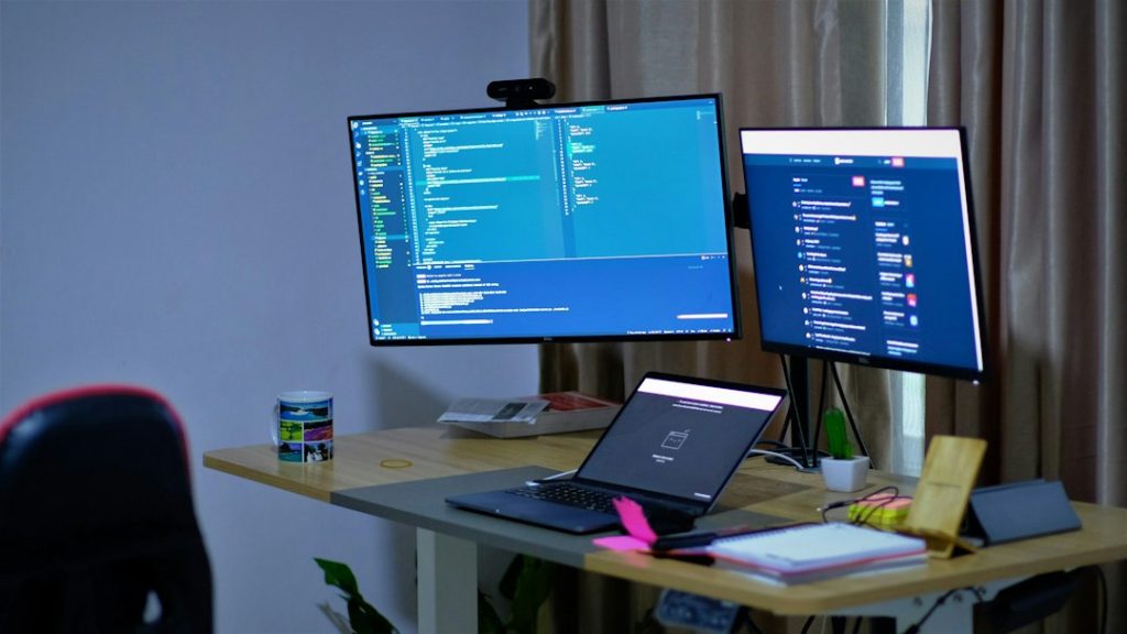 Computer workspace illustrating desktop configurations for remote work