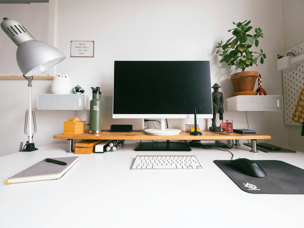 Home office workspace with a desktop computer and desk accessories